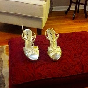 Gold small platform heels.